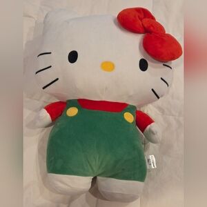 HELLO KITTY EXPANDING PLUSHEXPANDS TO 20"  OVERALLS XMAS